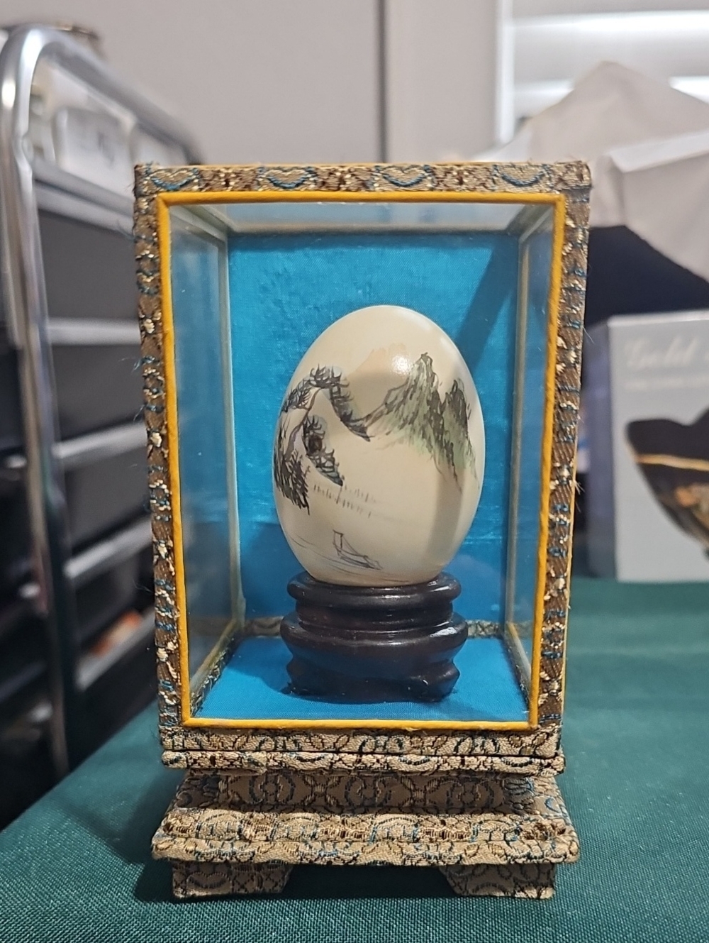 Decorative Hand-Painted Ivory Egg in Blue Display Case